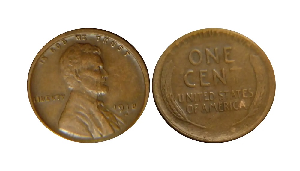 1918 wheat penny off-center strike error showing blank crescent of planchet and partial Lincoln design